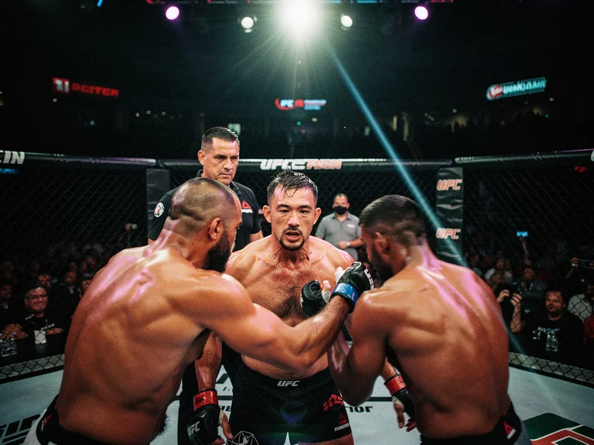 Dricus du Plessis UFC middleweight champion holding belt after title defense victory