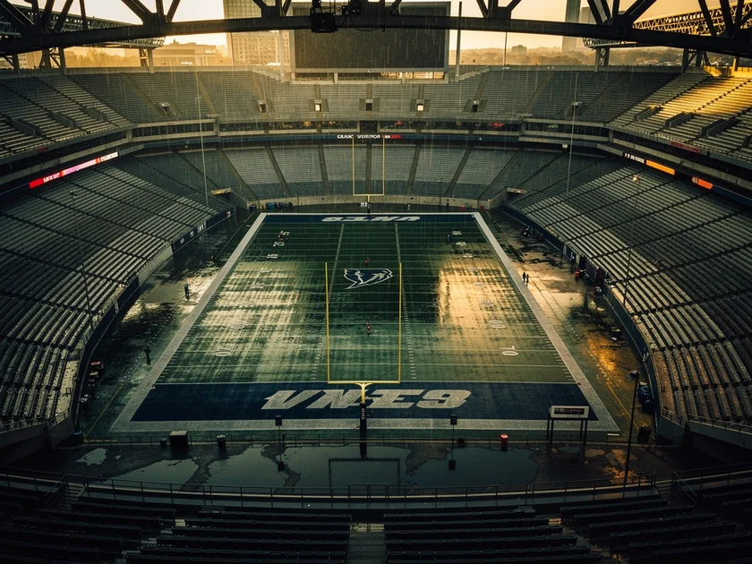 Manchester United players celebrating the 1999 treble trophy haul at Old Trafford in Premier League