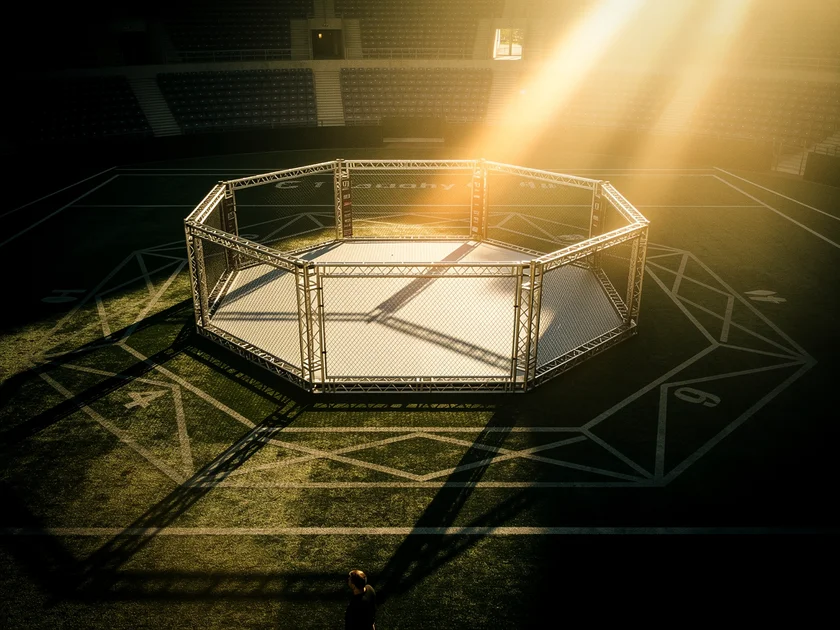 Israel Adesanya in fighting stance at UFC Fight Night event, preparing to face Joe Pyfer in 2026